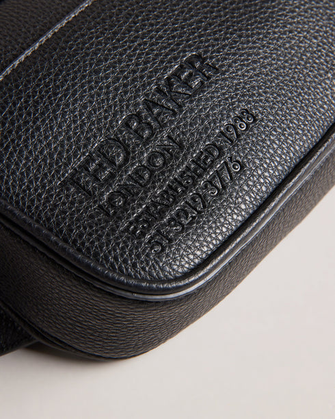 FABE-Bags-Introducing FABE, the faux leather belt bag that combines style and convenience in one sleek package. This hands-free hero keeps your essentials by your side whether you're exploring a new city or dancing the days away through festival season. Belt bag Faux leather Adjustable webbing strap Zip fastening Side release buckle Dimensions: 5cm x 12.5cm x 22.5cm- Ted Baker Romania